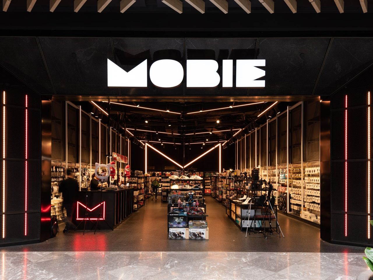 Mobie retail fit-out at Westfield Newmarket, featuring a modern phone accessories and repair store with illuminated signage and sleek interior design.